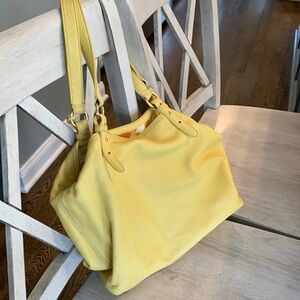 Vintage Cole Haan pebbled leather yellow hobo shoulder bag.